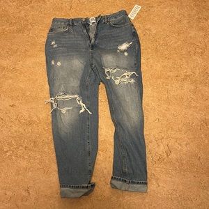 Brand new, never been worn mom jeans! Too big for me but still have tags on them
